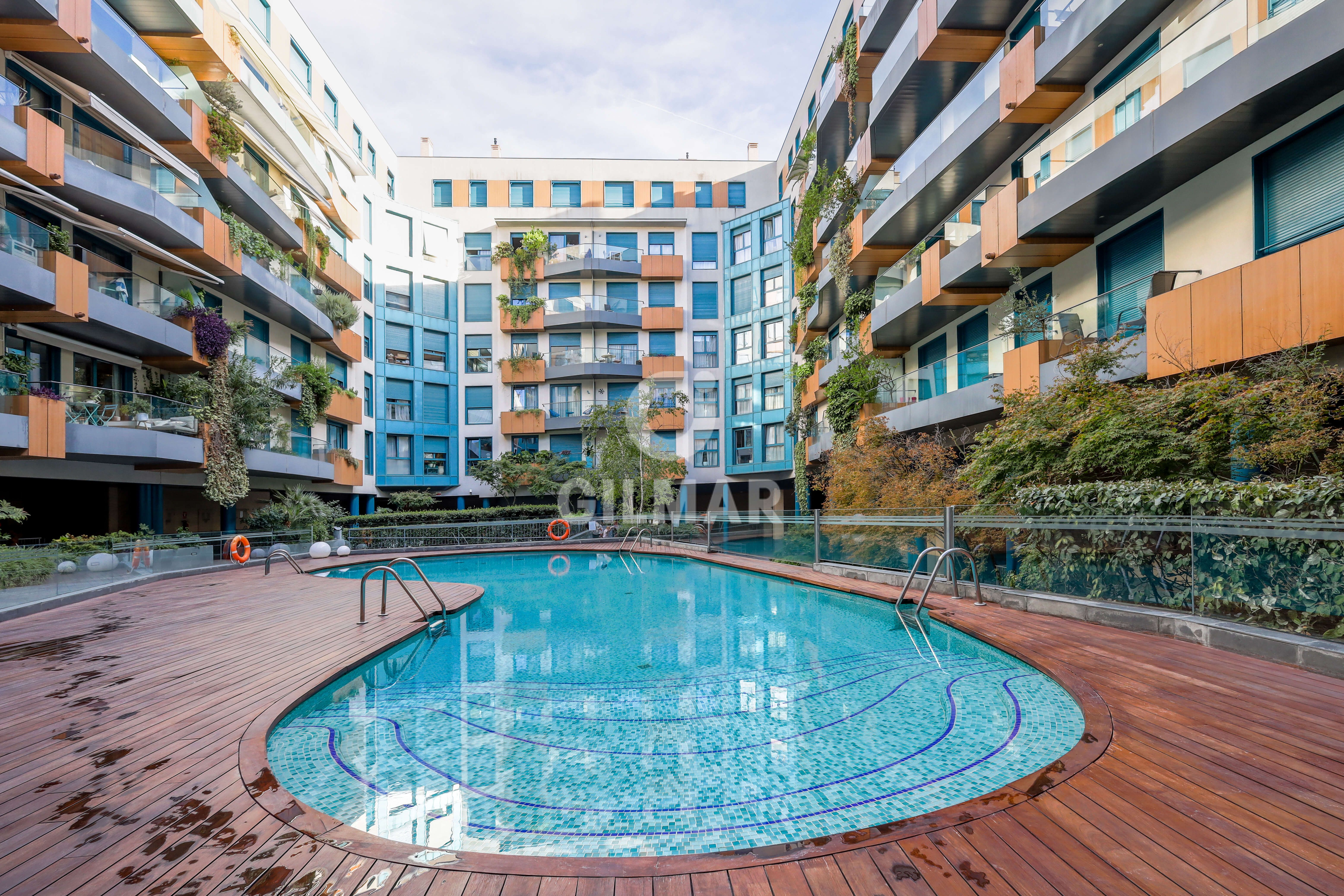 Swimming pool of Flat for sale in  Madrid Capital  with Heating, Private garden and Storage room