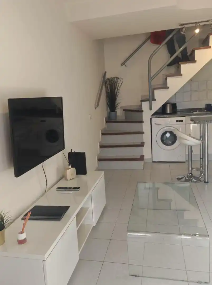 Sala d'estar de Apartament en venda en San Bartolomé de Tirajana amb Aire condicionat, Piscina i Moblat