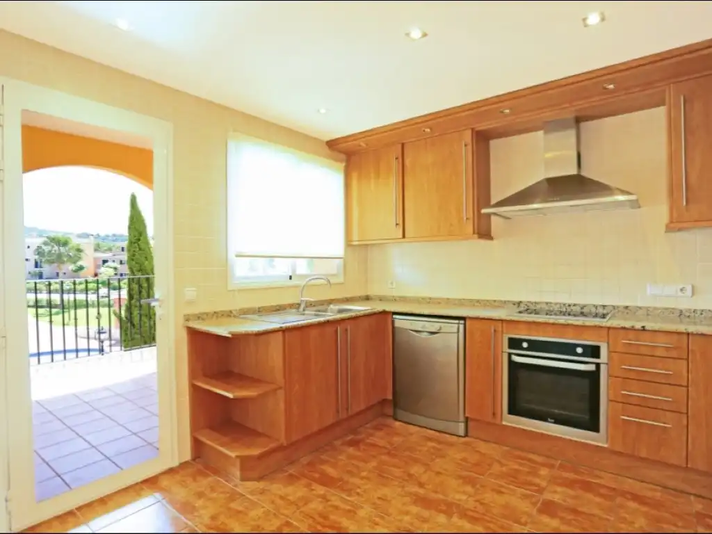 Cuina de Apartament de lloguer en Calvià amb Aire condicionat, Jardí privat i Terrassa