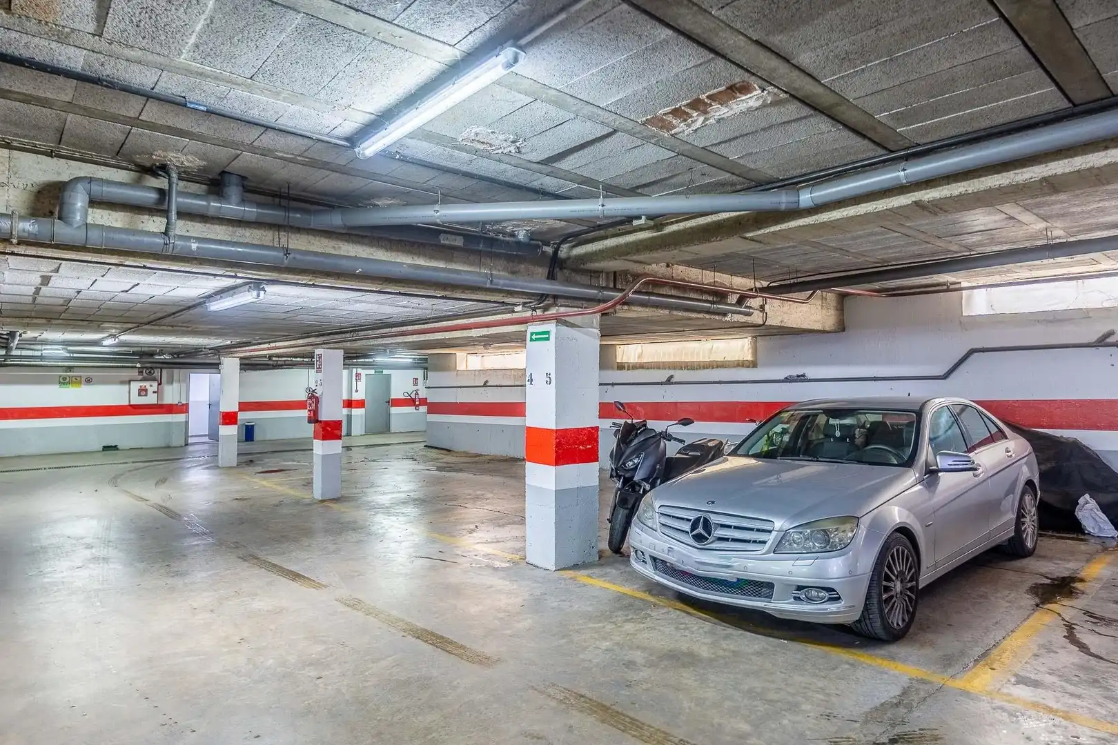 Parking of Duplexes for sale in Dos Hermanas  with Air Conditioner, Terrace and Community pool