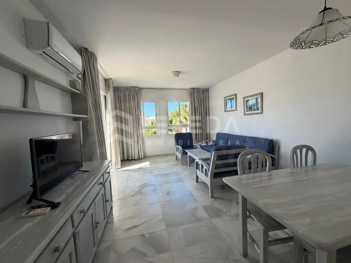Sala de estar de Apartamento en venta en Roquetas de Mar con Aire acondicionado, Terraza y Piscina comunitaria