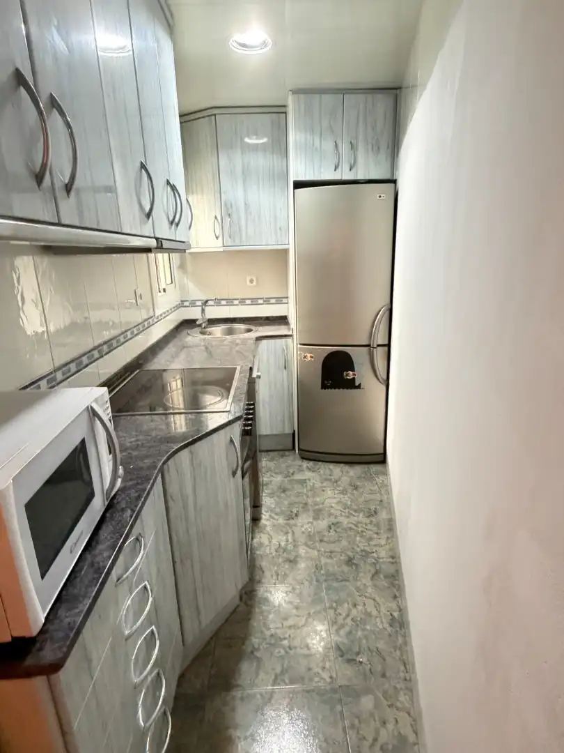 Küche von Wohnung zum Verkauf in Barcelona mit Klimaanlage und Heizung