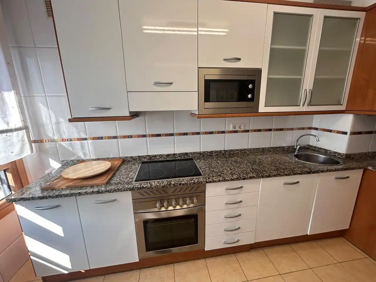 Kitchen of Flat for rent in Gijón   with Heating, Terrace and Storage room