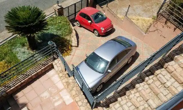 Parking de Casa adosada en venta en Córdoba con Aire acondicionado, Calefacción y Jardín privado