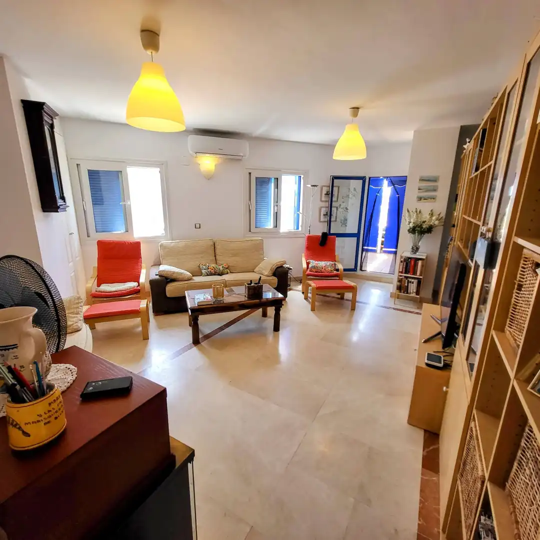 Sala d'estar de Planta baixa en venda en Manilva amb Aire condicionat, Jardí privat i Terrassa