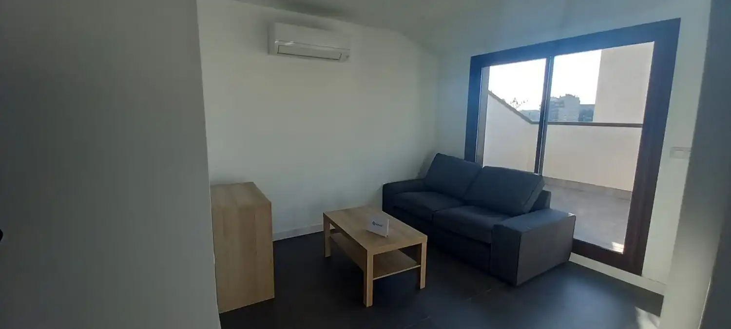 Sala d'estar de Àtic de lloguer en  Murcia Capital amb Aire condicionat, Terrassa i Moblat