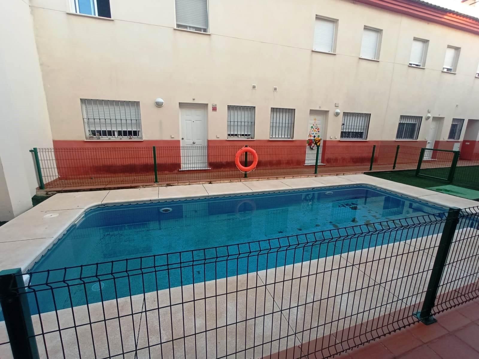 Swimming pool of Single-family semi-detached for sale in Brenes  with Terrace and Community pool