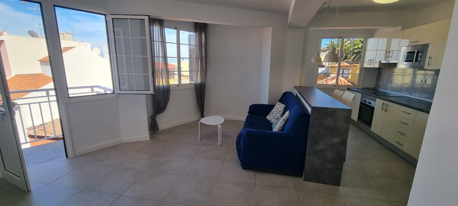 Sala d'estar de Pis de lloguer en La Orotava amb Traster