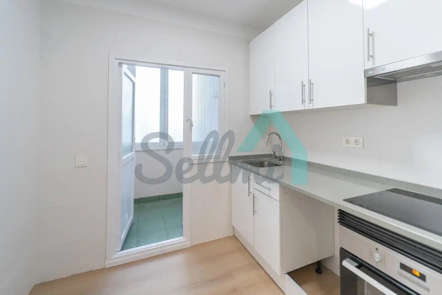 Kitchen of Flat for sale in Oviedo   with Heating, Parquet flooring and Storage room