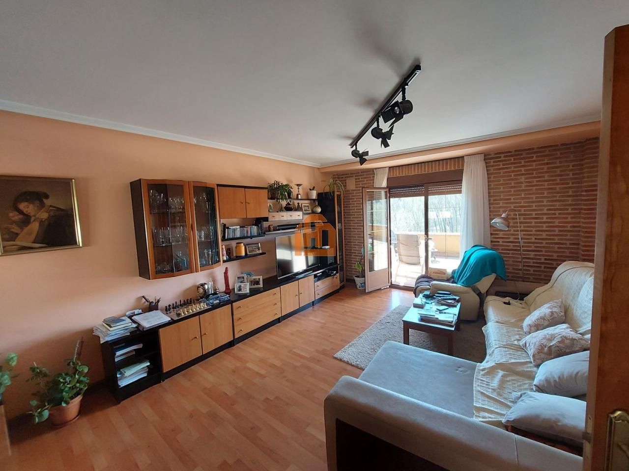 Sala d'estar de Casa adosada en venda en San Andrés del Rabanedo amb Calefacció, Jardí privat i Parquet