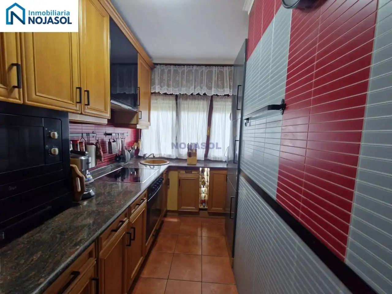 Cuina de Apartament en venda en Noja amb Calefacció, Terrassa i Moblat