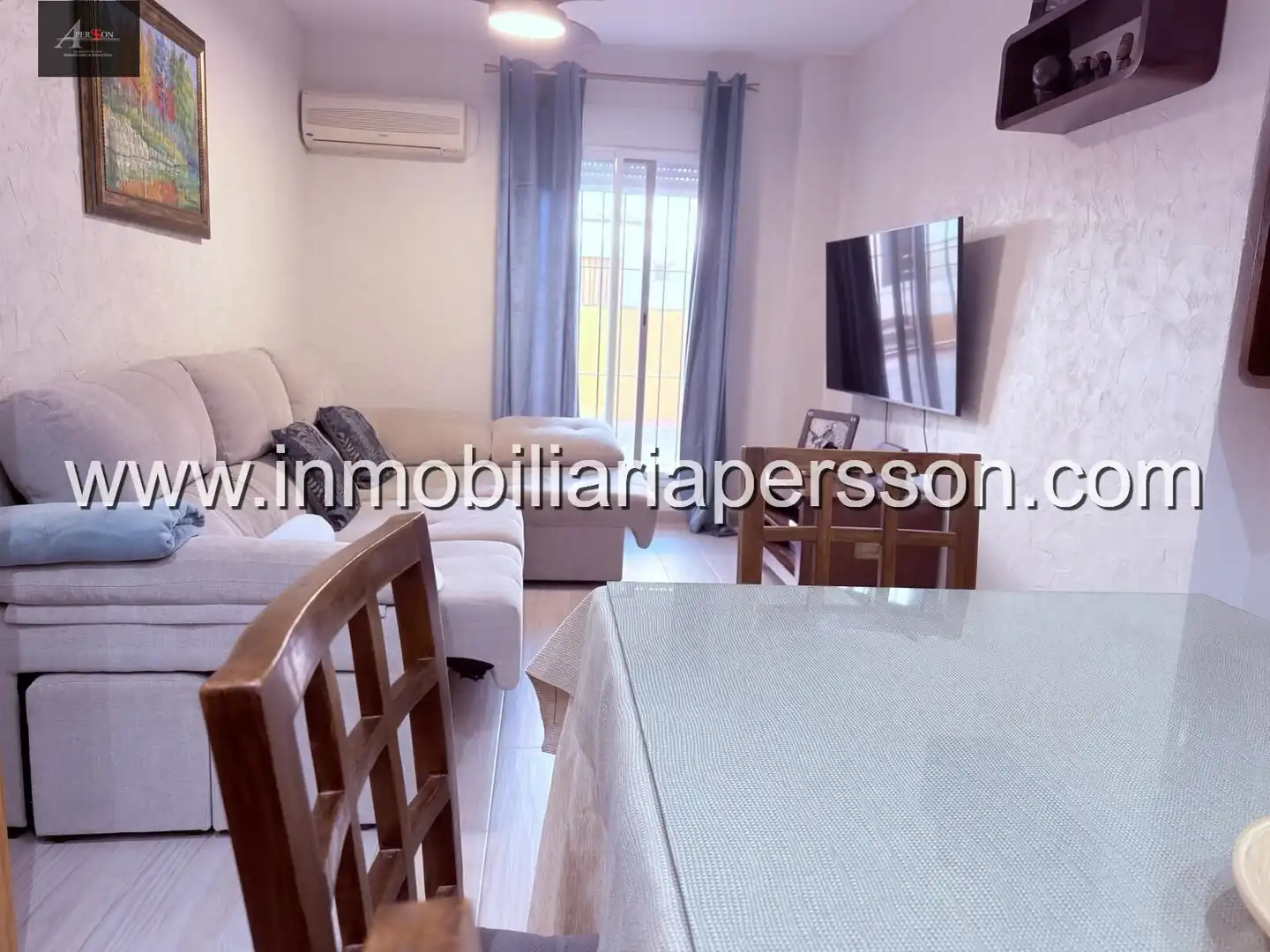 Sala d'estar de Casa adosada en venda en Écija amb Aire condicionat i Terrassa