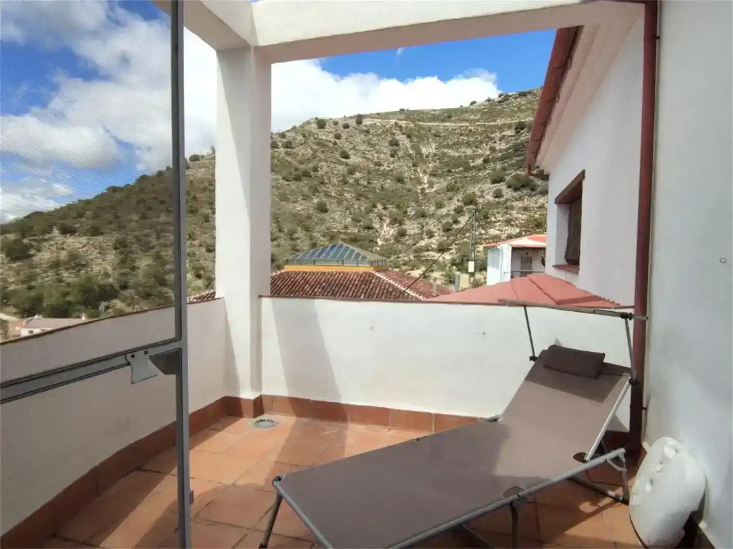 Terrassa de Casa adosada en venda en Alpandeire amb Aire condicionat, Jardí privat i Parquet