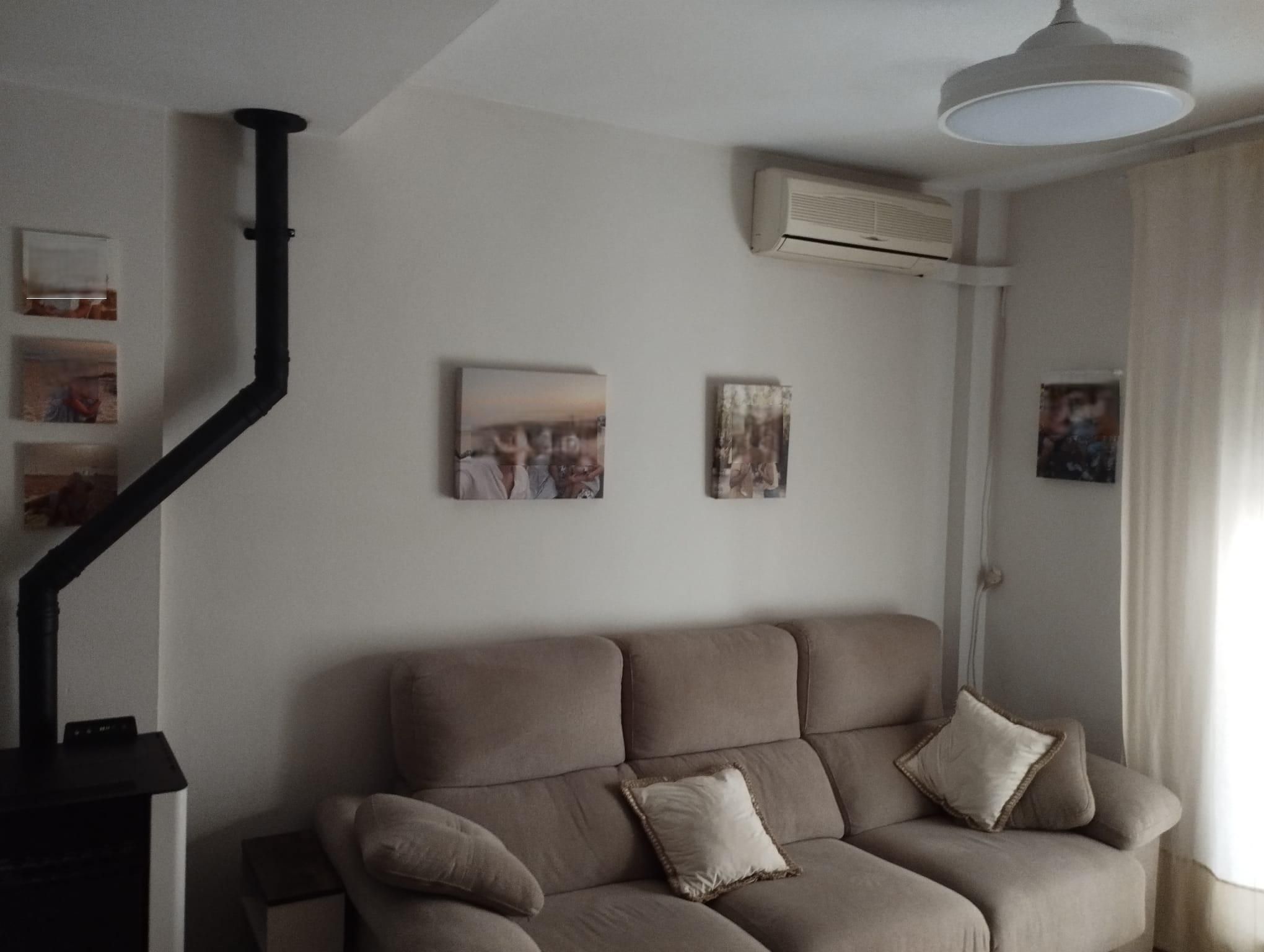 Sala d'estar de Casa adosada en venda en Jerez de la Frontera amb Aire condicionat i Parquet