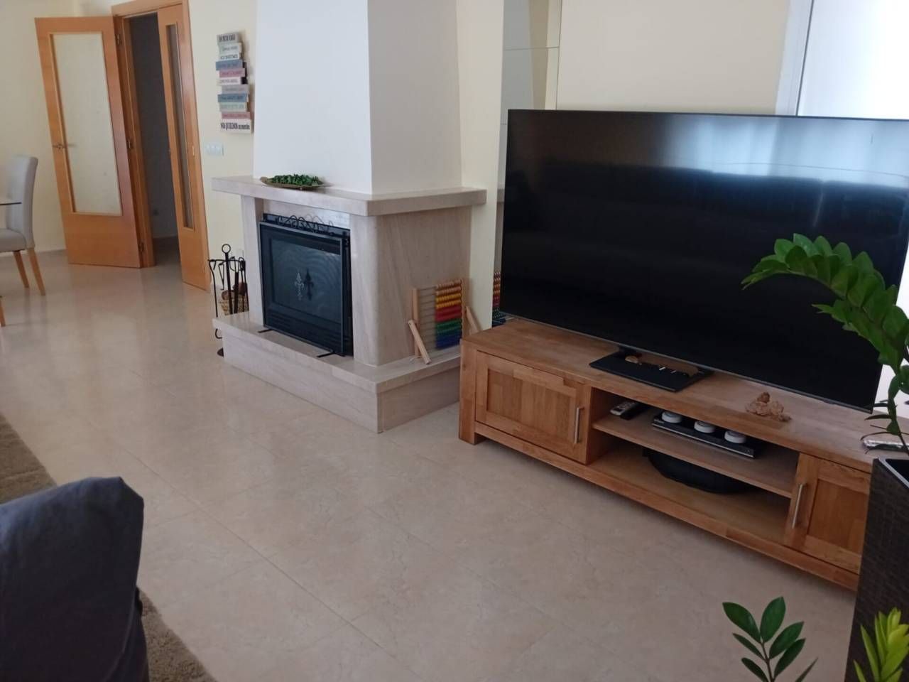 Sala d'estar de Casa adosada en venda en Palma de Gandia amb Aire condicionat, Parquet i Terrassa