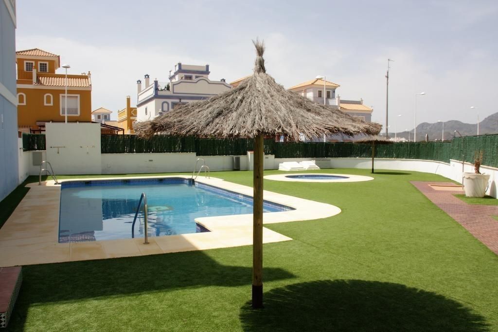 Swimming pool of Duplex to rent in Pulpí  with Air Conditioner, Heating and Private garden