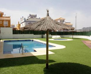 Swimming pool of Duplex to rent in Pulpí  with Air Conditioner, Heating and Private garden