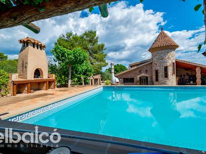 Swimming pool of House or chalet for sale in El Milà  with Air Conditioner, Heating and Private garden