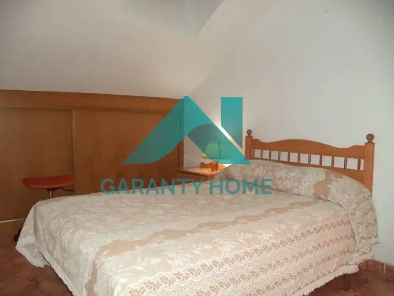 Dormitori de Apartament de lloguer en Cáceres amb Aire condicionat i Moblat