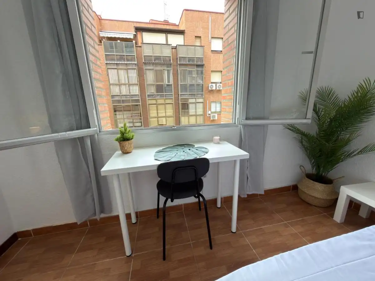 Bedroom of Apartments for share in Madrid  with Heating, Furnished and Washing machine