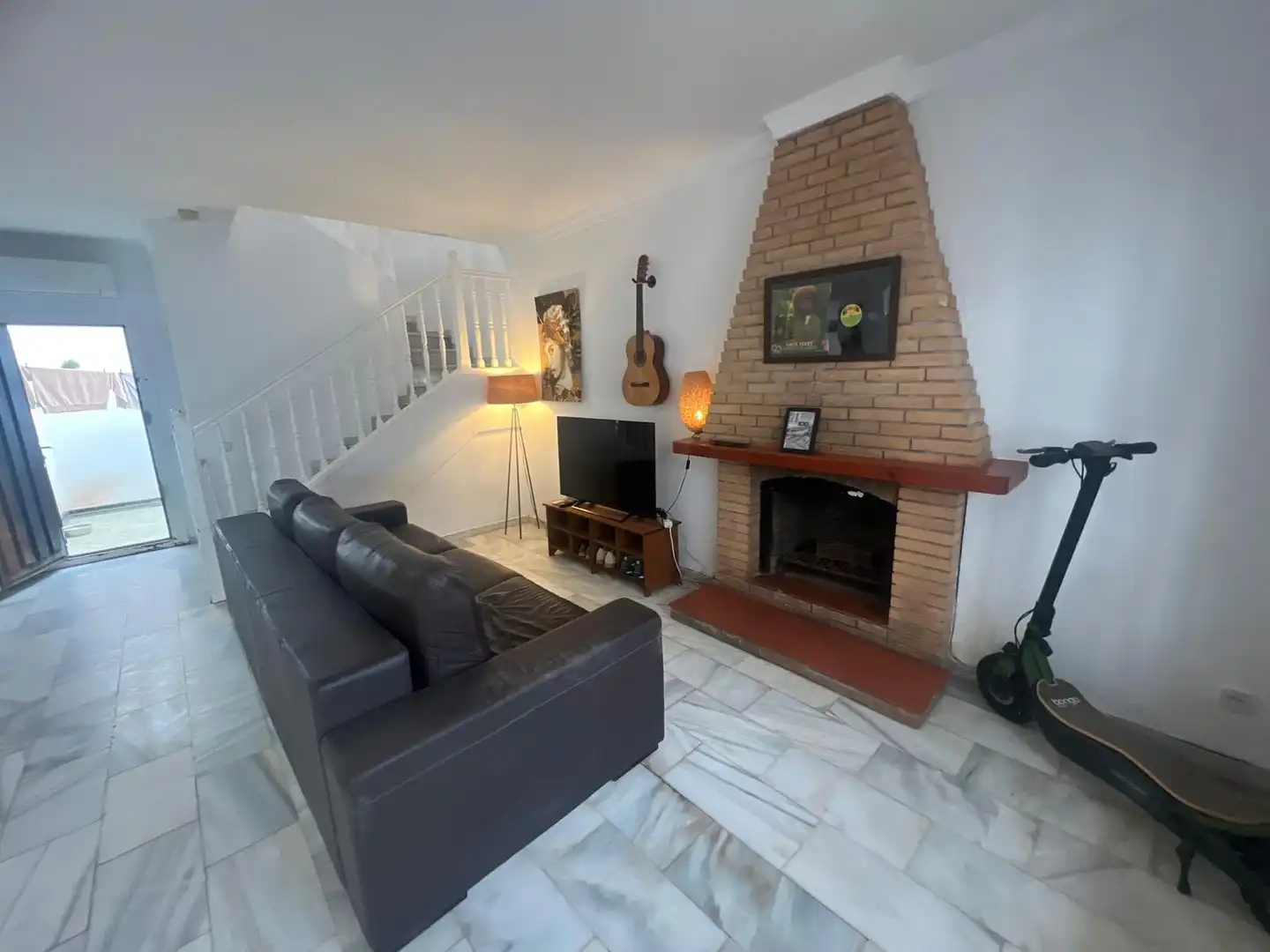 Sala de estar de Casa adosada en venta en Manilva con Aire acondicionado, Terraza y Horno