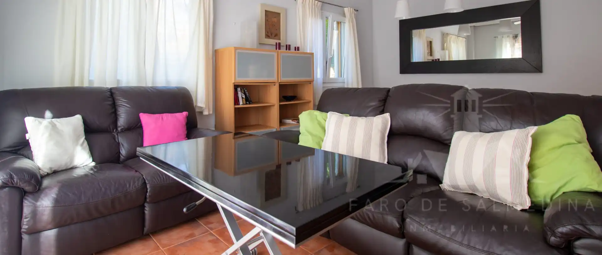 Sala de estar de Casa adosada en venta en Rota con Aire acondicionado, Terraza y Piscina comunitaria