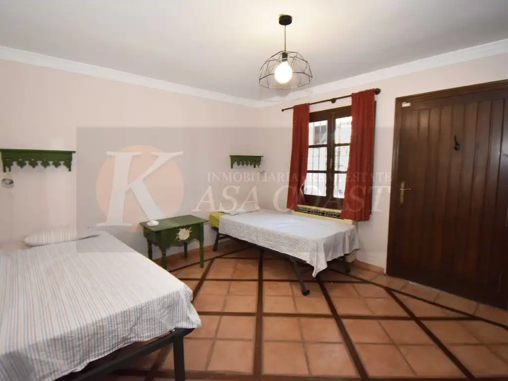 Habitación de Casa adosada en venta en Fuengirola con Aire acondicionado, Jardín privado y Terraza