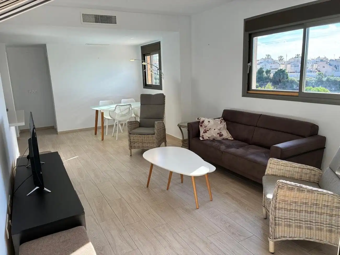 Sala d'estar de Apartament en venda en Orihuela amb Aire condicionat, Jardí privat i Terrassa