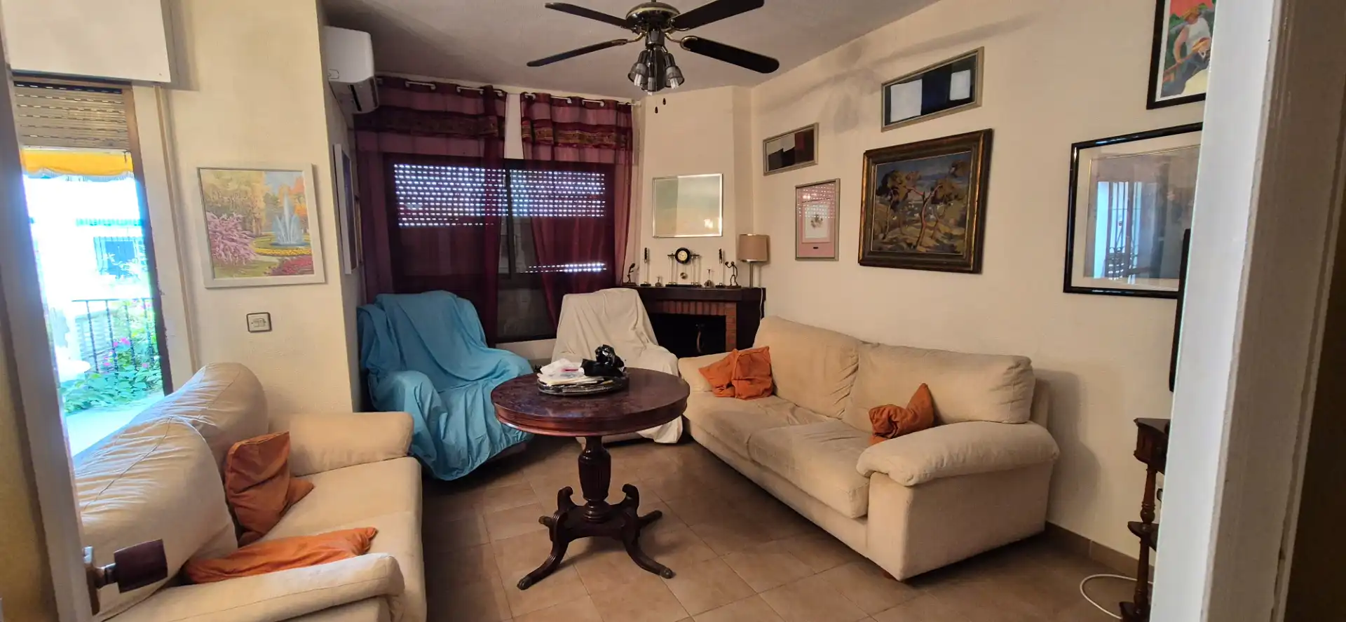 Sala de estar de Casa adosada en venta en Roquetas de Mar con Aire acondicionado, Terraza y Piscina