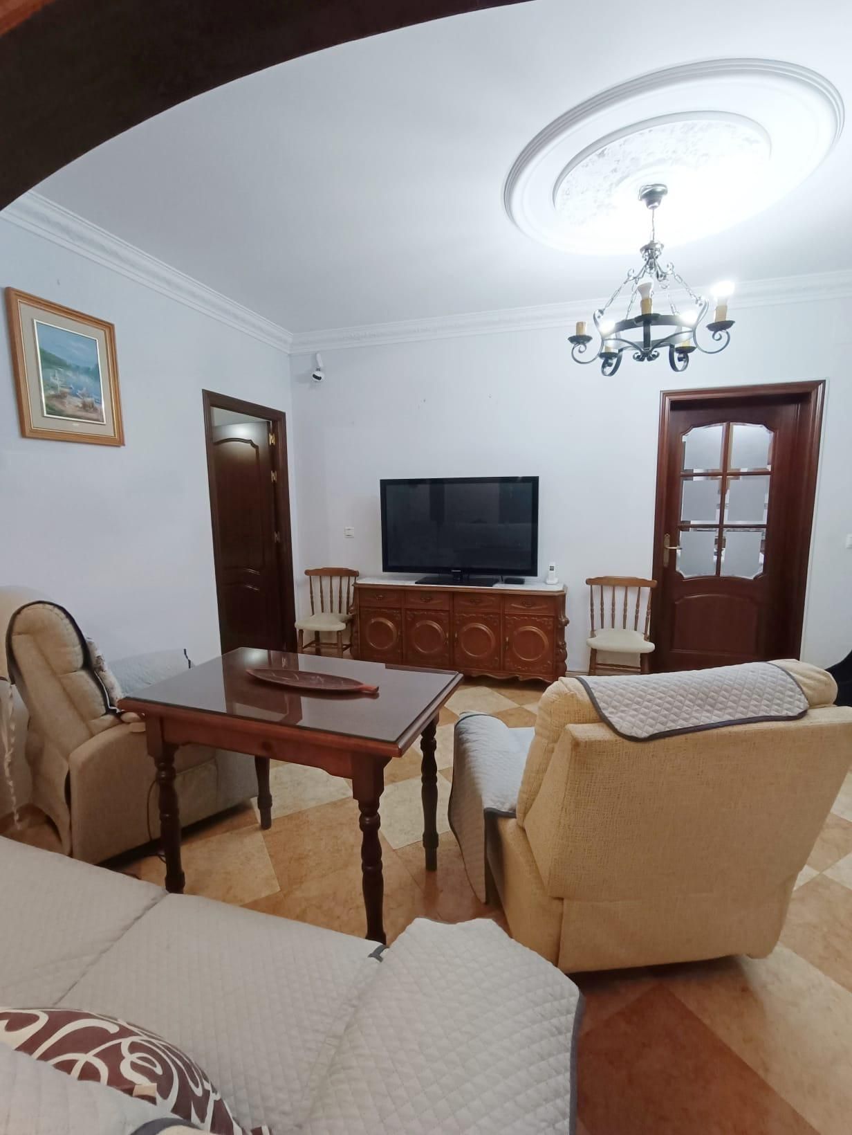 Sala d'estar de Casa o xalet en venda en Utrera amb Aire condicionat, Terrassa i Traster