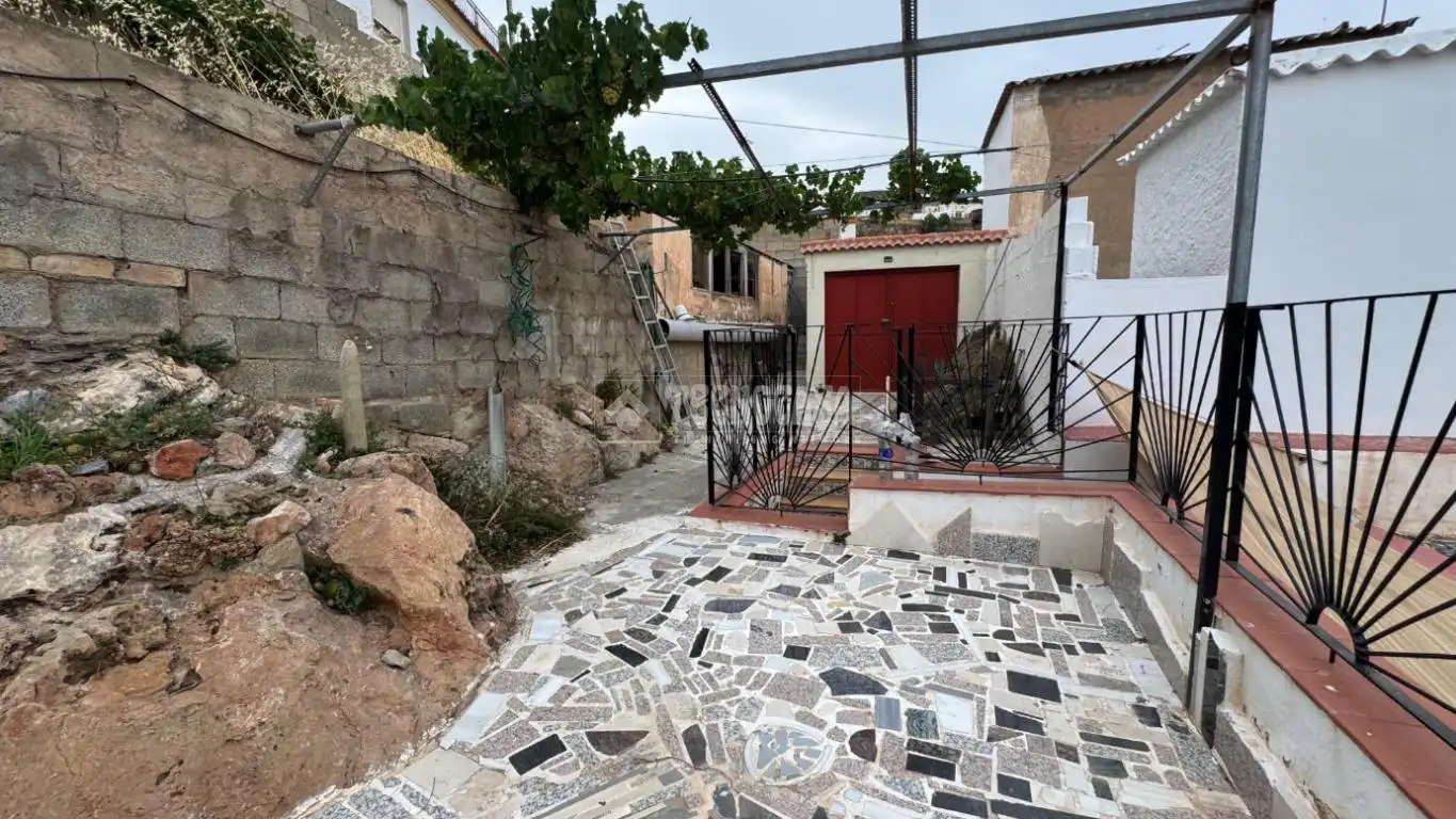 Vista exterior de Casa adosada en venda en Murtas amb Jardí privat