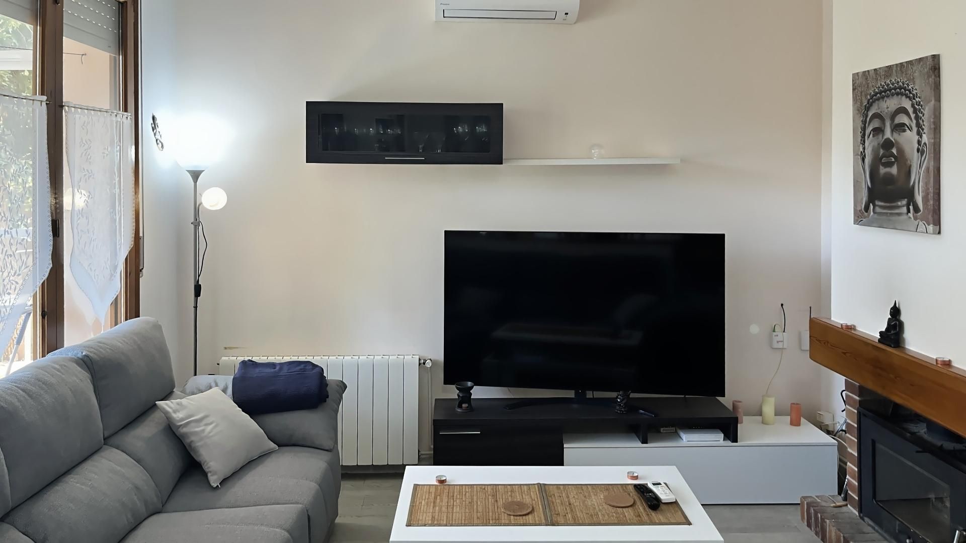 Sala d'estar de Casa o xalet en venda en Caldes de Malavella amb Calefacció i Terrassa