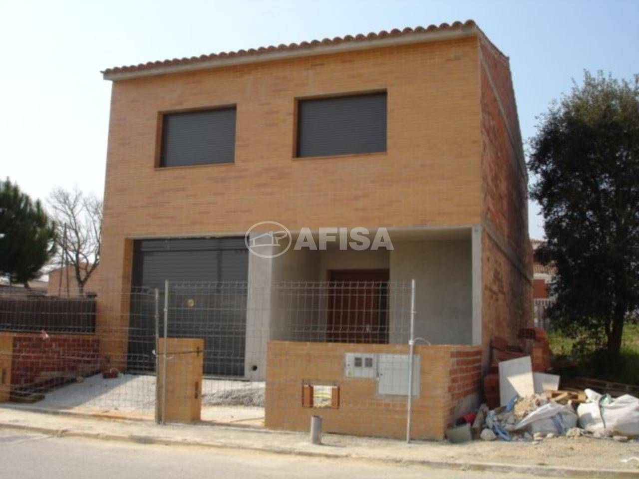 Vista exterior de Casa adosada en venda en Sils amb Aire condicionat, Calefacció i Jardí privat