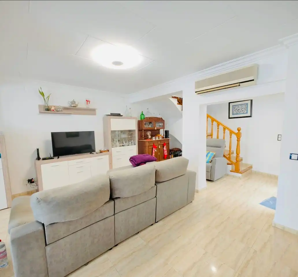 Sala d'estar de Casa adosada en venda en Dénia amb Aire condicionat, Calefacció i Terrassa