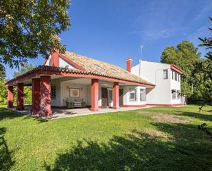 Vista exterior de Casa o xalet en venda en Tomares amb Aire condicionat, Jardí privat i Parquet