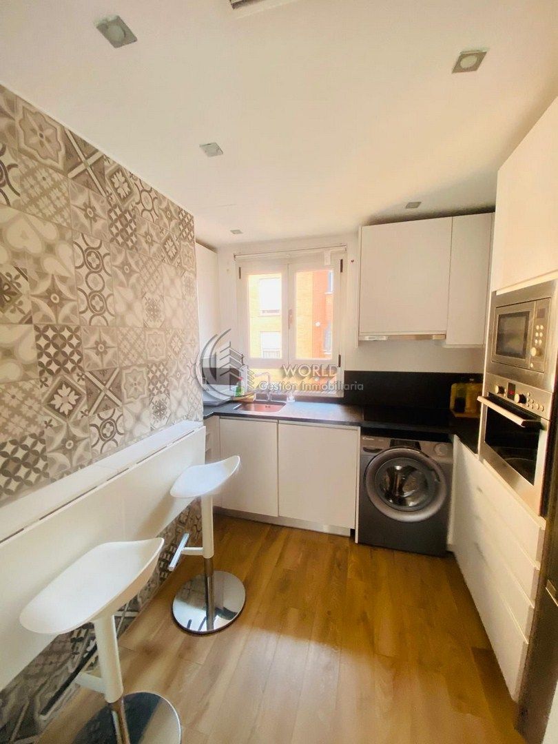 Kitchen of Attic for sale in  Madrid Capital  with Air Conditioner, Furnished and Oven