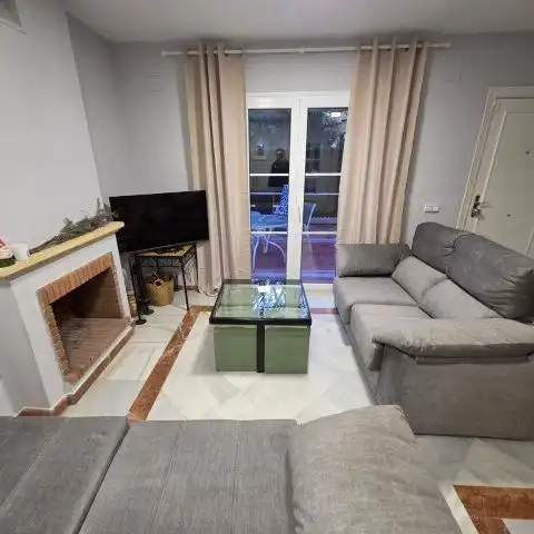 Sala d'estar de Casa adosada de lloguer en Islantilla amb Terrassa
