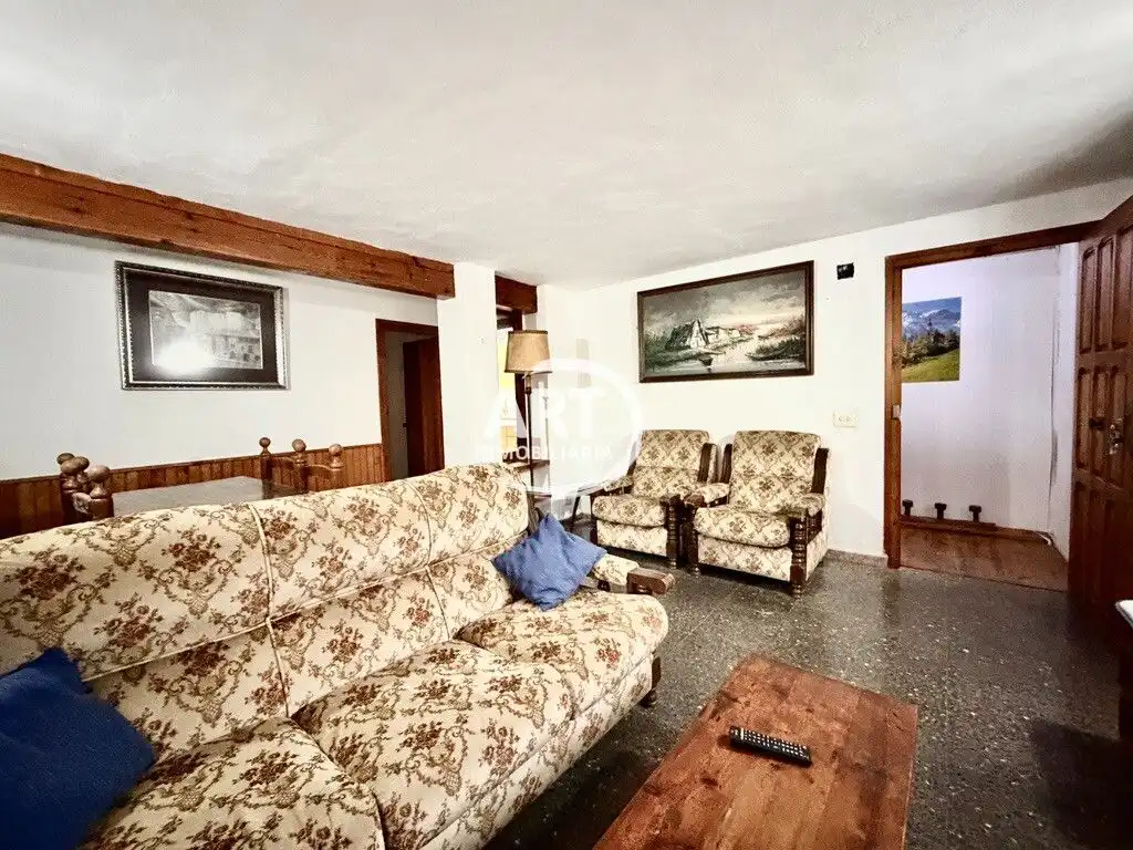 Sala d'estar de Finca rústica en venda en Alcalá de la Selva amb Calefacció i Moblat