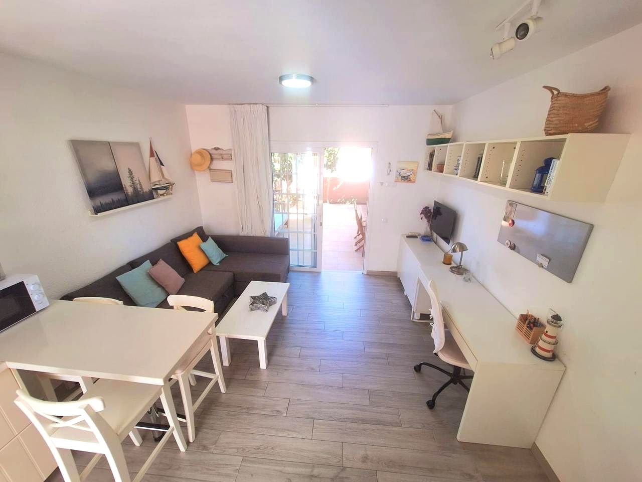 Sala d'estar de Dúplex de lloguer en San Bartolomé de Tirajana amb Aire condicionat, Terrassa i Moblat