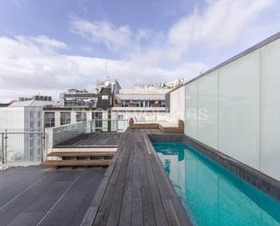 Swimming pool of Attic for sale in  Madrid Capital  with Air Conditioner, Heating and Terrace