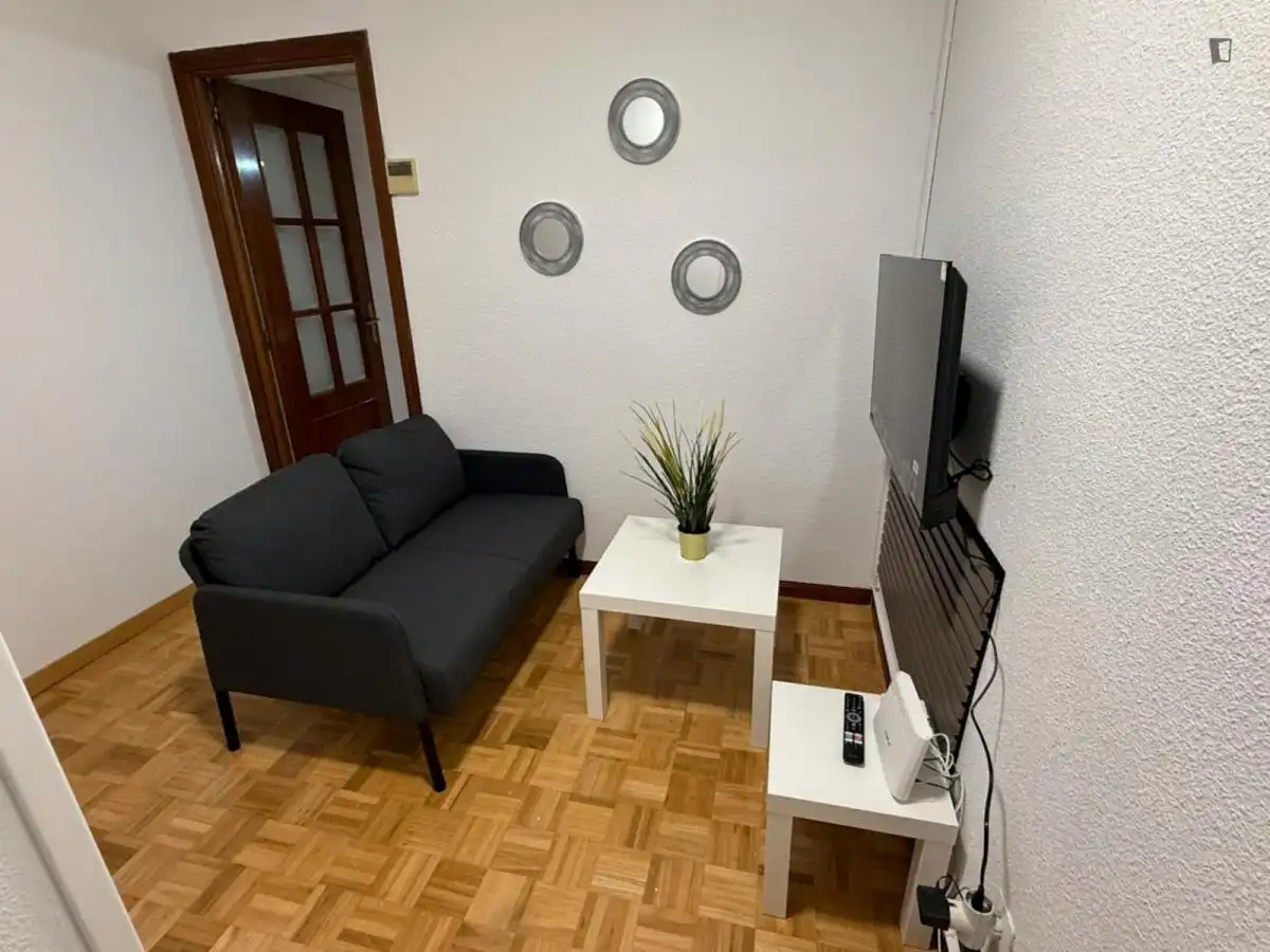 Sala de estar de Apartamento para compartir en Coslada con Aire acondicionado, Calefacción y Amueblado