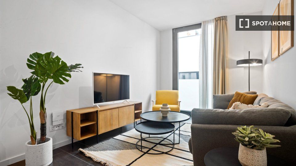 Sala de estar de Piso de alquiler en  Barcelona Capital con Aire acondicionado, Calefacción y Amueblado