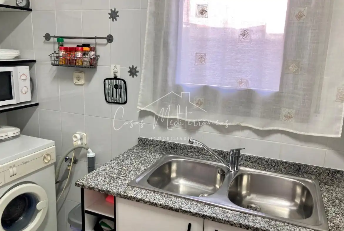 Cocina de Casa adosada de alquiler en Vandellòs i l'Hospitalet de l'Infant con Jardín privado, Terraza y Amueblado