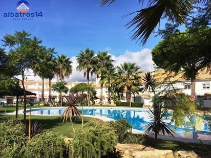 Jardí de Casa adosada en venda en El Portil amb Aire condicionat, Terrassa i Balcó