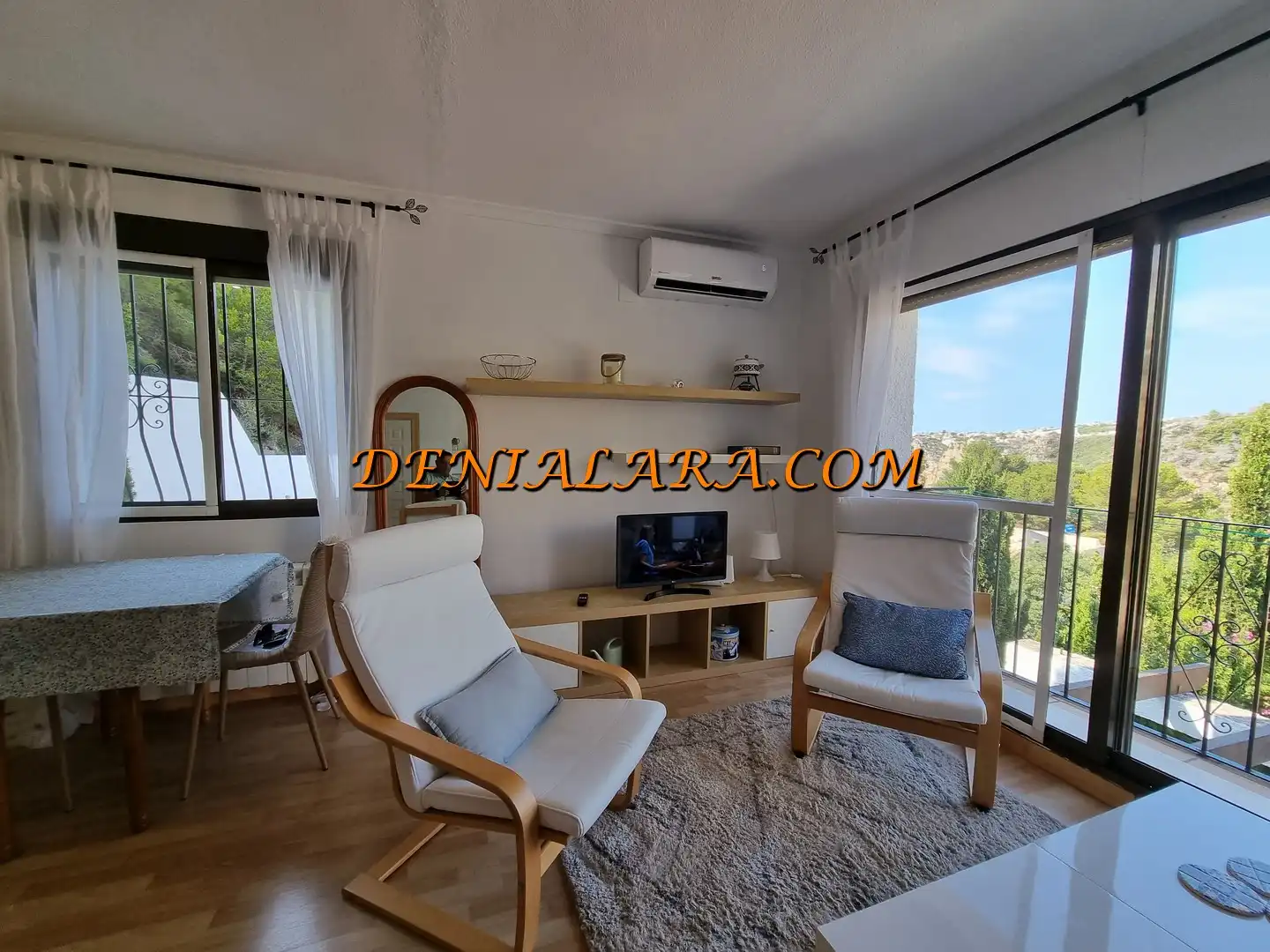 Sala d'estar de Apartament en venda en Benitachell / El Poble Nou de Benitatxell amb Aire condicionat, Balcó i Internet