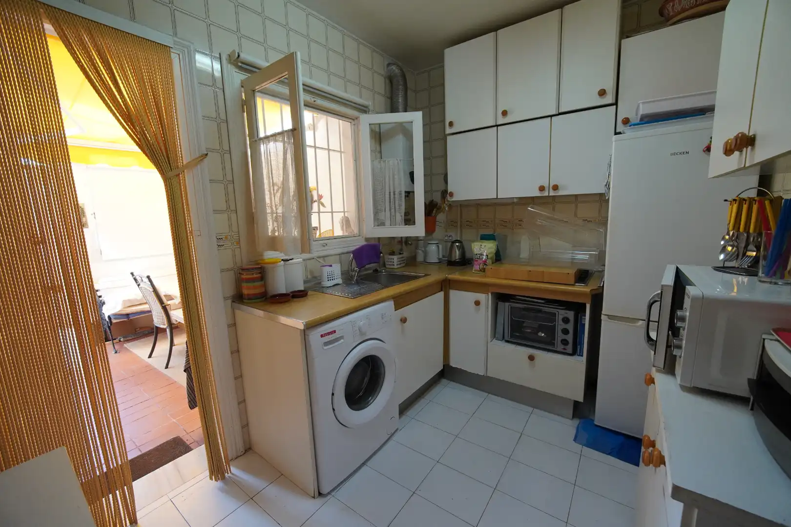 Cuina de Casa adosada en venda en Roquetas de Mar amb Jardí privat, Terrassa i Traster