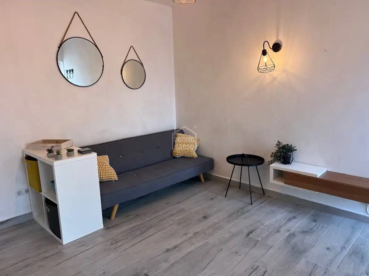 Sala d'estar de Apartament en venda en Sant Lluís amb Jardí privat, Terrassa i Moblat