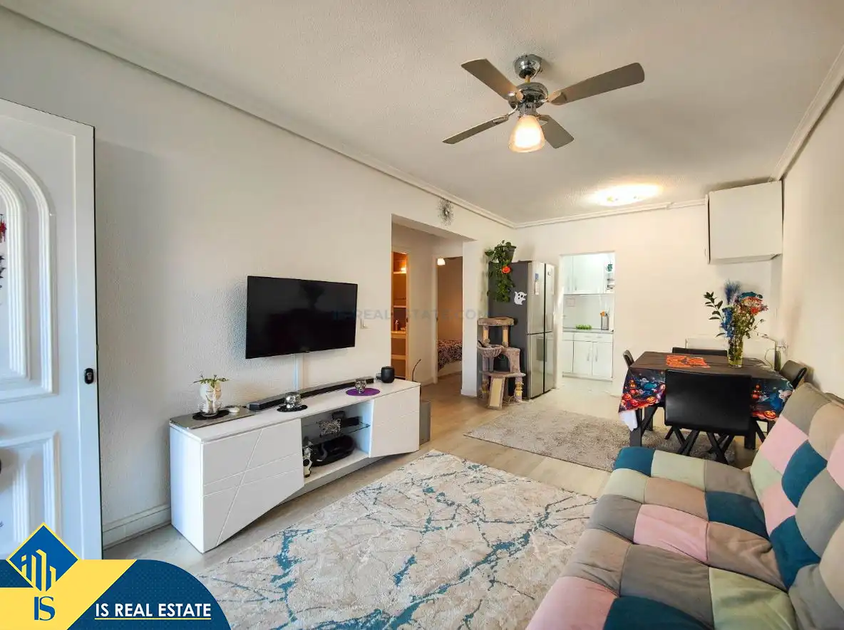Sala de estar de Casa adosada en venta en Torrevieja con Aire acondicionado, Calefacción y Jardín privado