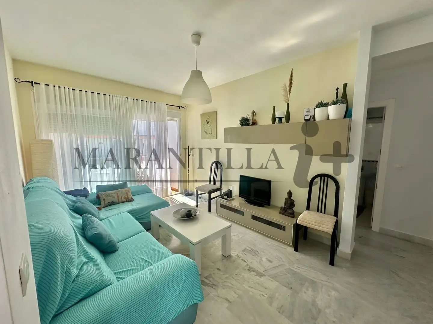 Sala de estar de Ático en venta en Islantilla con Terraza, Trastero y Piscina comunitaria