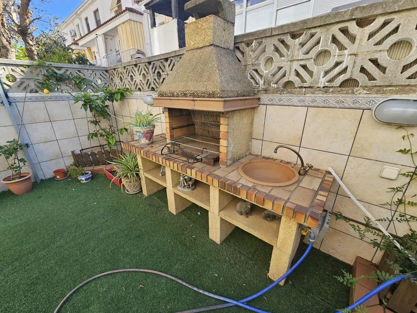 Garten von Einfamilien-Reihenhaus zum Verkauf in Malgrat de Mar mit Klimaanlage, Heizung und Privatgarten